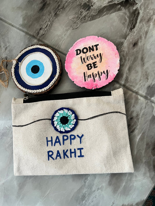 Rakhi Special Gift Combo – Handmade Wooden evil eye and dont worry be happy- Set with Canvas Pouch