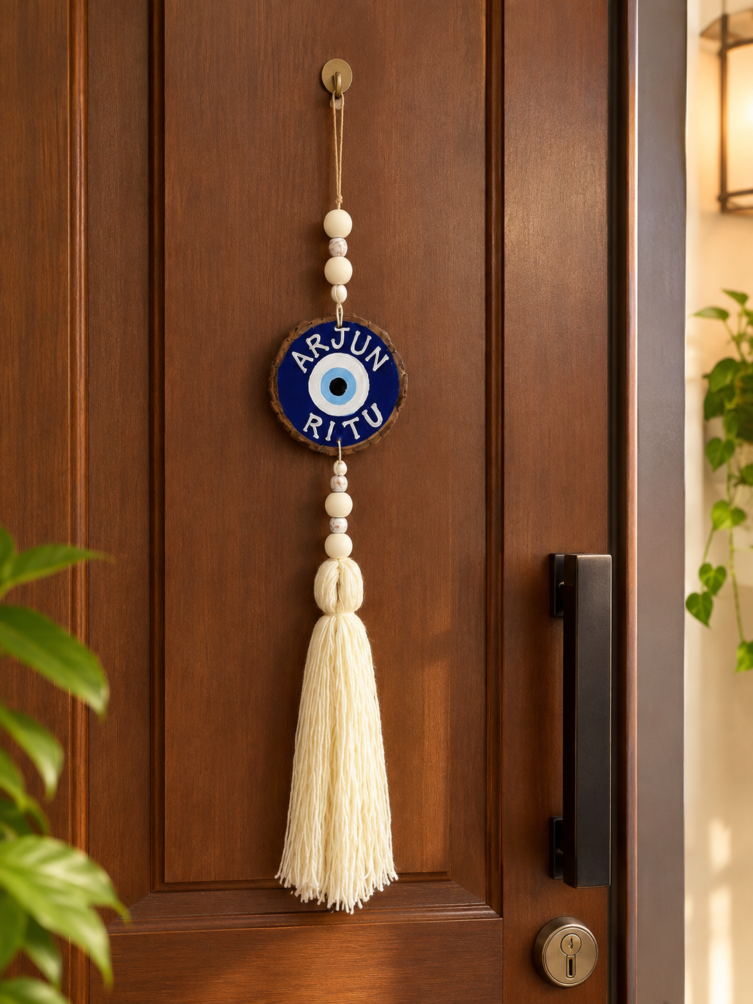 Couple name customised on Evil eye - wWith long threads and beads