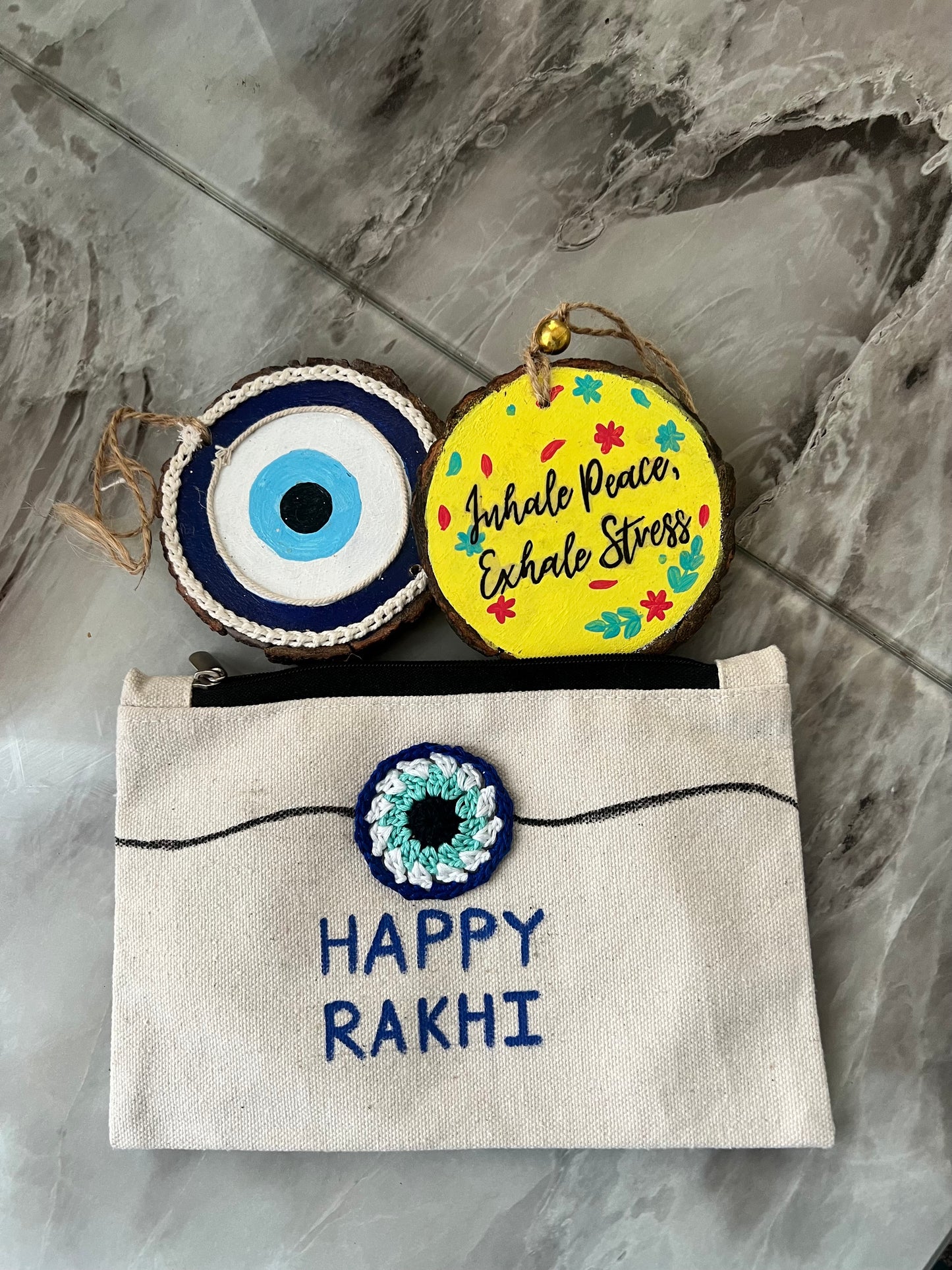 Rakhi Special Gift Combo – Handmade Wooden evil eye and inhale peace- Set with Canvas Pouch