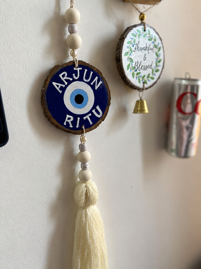 Couple name customised on Evil eye - wWith long threads and beads